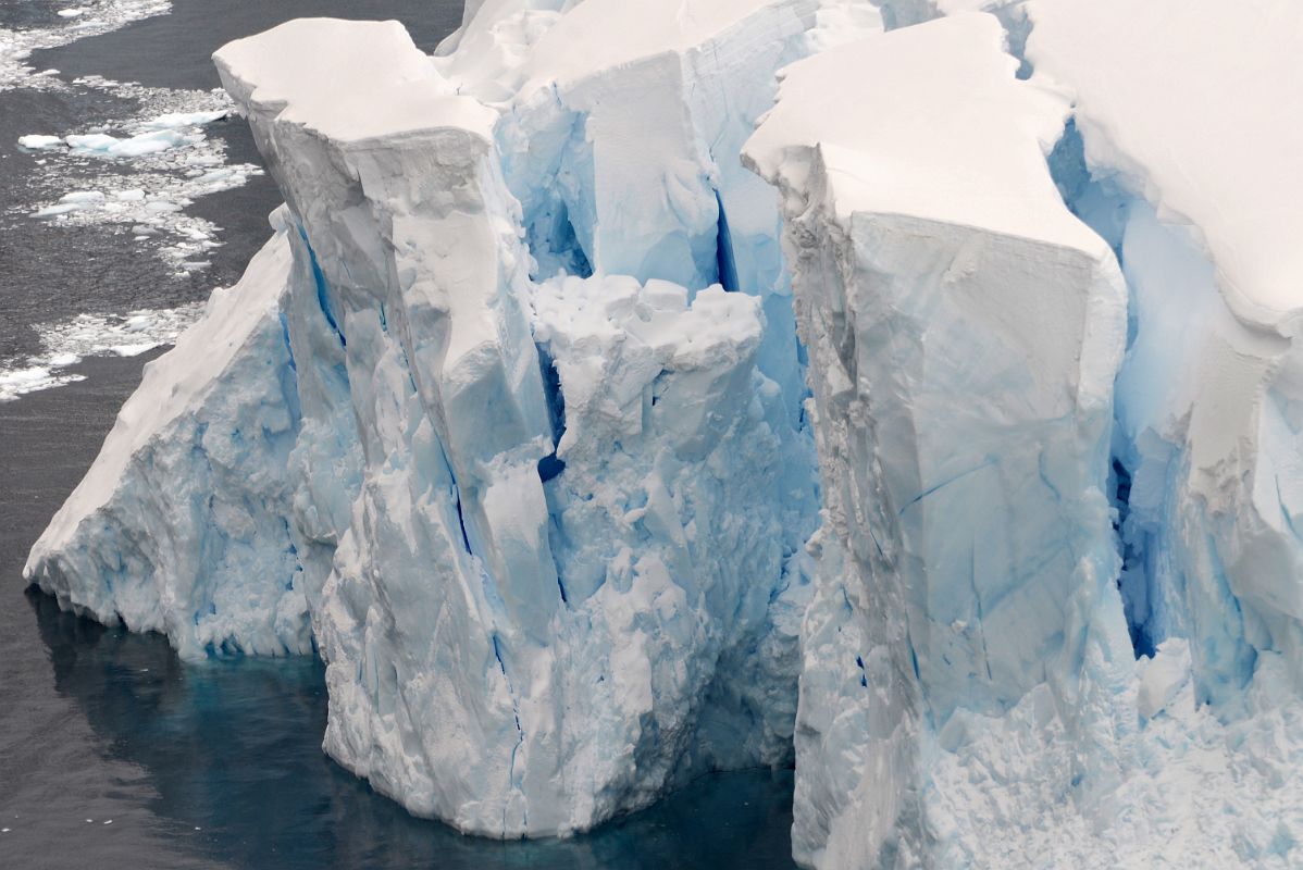 09B Huge Blocks Of Ice Close Up About To Calf From Glacier Viewpoint At Neko Harbour On Quark Expeditions Antarctica Cruise